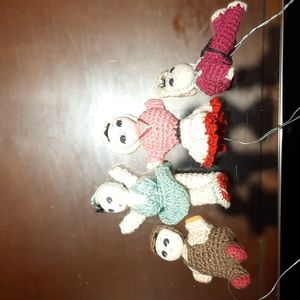 Small crocheted dolls finger puppets